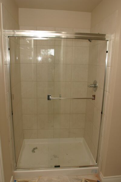 Master shower - new door and faucets
