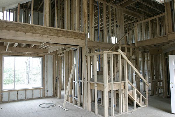 Front Living Room looking back to Dining Room. \nFront entry to the right.