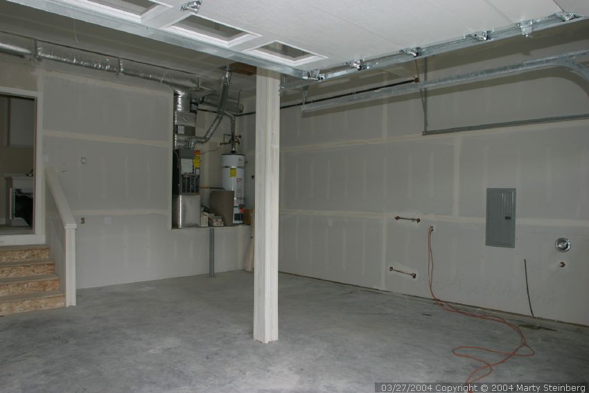 Hot water heater is in and running, power panel is complete, hot & cold running water tap to the right of the power panel will make washing dive gear easier.